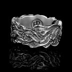 「津波」リング – 青いサファイアが輝く925シルバー製ウェーブリング